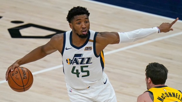 Donovan Mitchell and T.J. McConnell, The Canadian Press Donovan Mitchell and T.J. McConnell