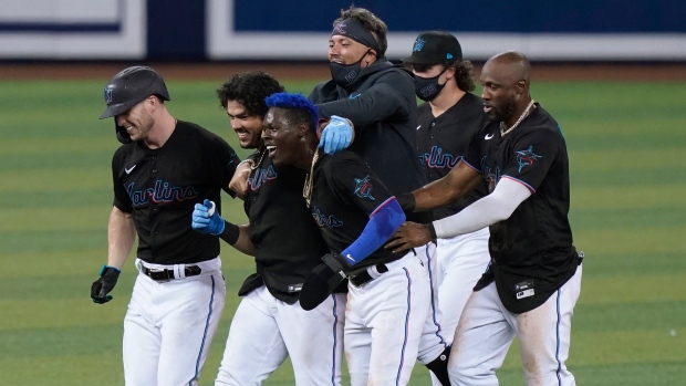 Miami Marlins celebrate, The Canadian Press Miami Marlins celebrate