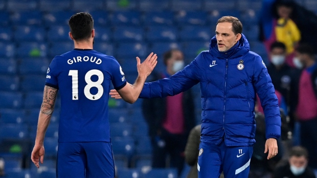 Chelsea's head coach Thomas Tuchel and Olivier Giroud