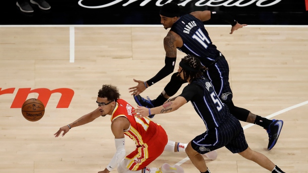 Trae Young, Cole Anthony and Gary Harris