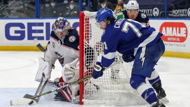 Elvis Merzlikins and Anthony Cirelli 