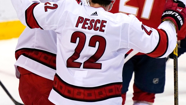 Nino Niederreiter and Brett Pesce, The Canadian Press Nino Niederreiter and Brett Pesce