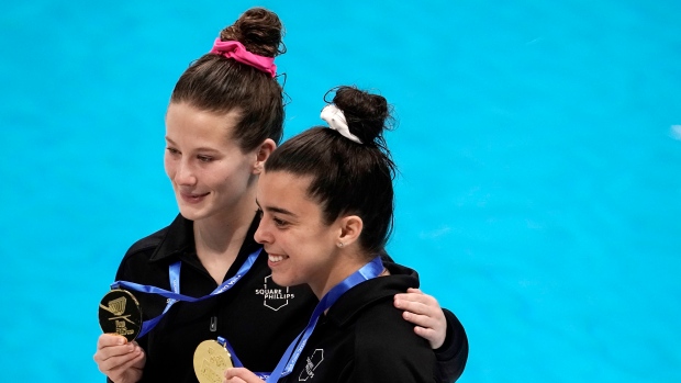 Canada's Meaghan Benefeito, right, and Caeli McKay,