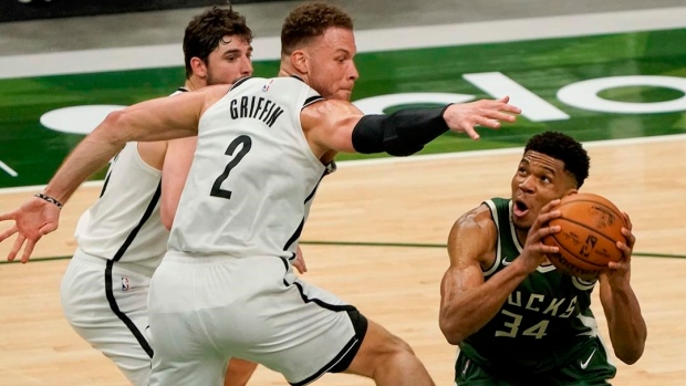 Giannis Antetokounmpo attempts a shot against the Brooklyn Nets