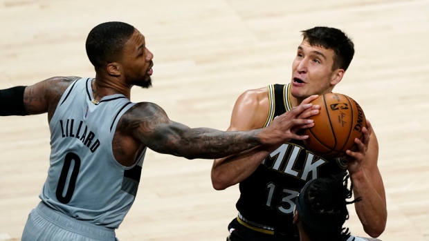Damian Lillard Bogdan Bogdanovic, The Canadian Press Damian Lillard Bogdan Bogdanovic