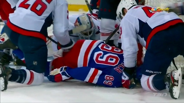 Tom Wilson punches Pavel Buchnevich