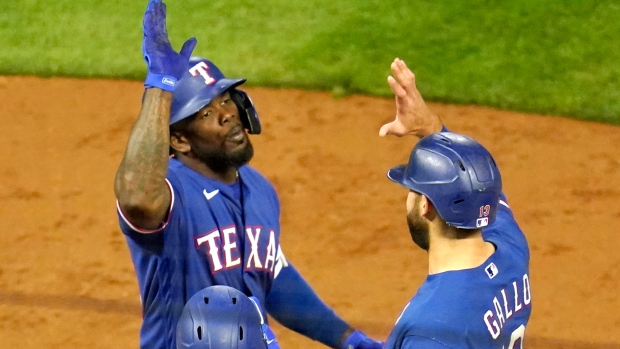 Adolis García homers in 10th, Texas Rangers come back to beat