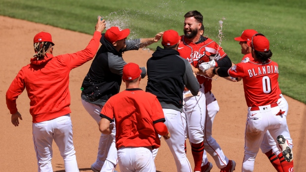 Jesse Winker and Cincinnati Reds celebrate, The Canadian Press Jesse Winker and Cincinnati Reds celebrate