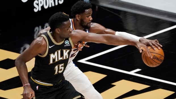 Deandre Ayton Clint Capela, The Canadian Press Deandre Ayton Clint Capela