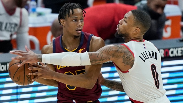 Isaac Okoro, Damian Lillard , The Canadian Press Isaac Okoro, Damian Lillard