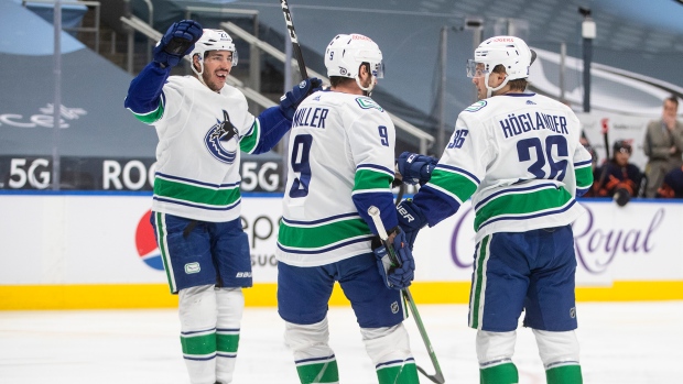 Vancouver Canucks celebrate , The Canadian Press Vancouver Canucks celebrate