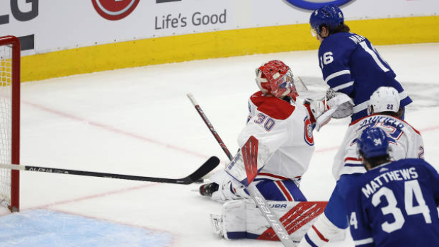 Mitch Marner scores on Cayden Primeau, Getty Images Mitch Marner scores on Cayden Primeau