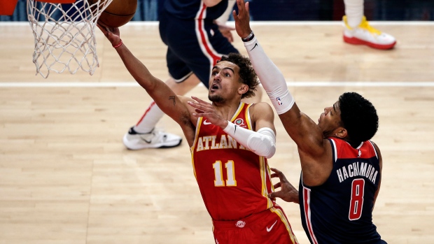Trae Young, Rui Hachimura, The Canadian Press Trae Young, Rui Hachimura