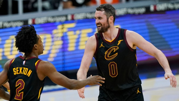 Cleveland Cavaliers' Kevin Love and Collin Sexton