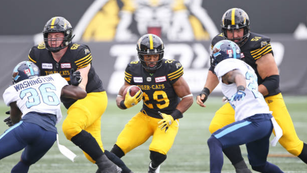 Jackson Bennett rushes vs. Toronto Argonauts, Getty Images Jackson Bennett rushes vs. Toronto Argonauts