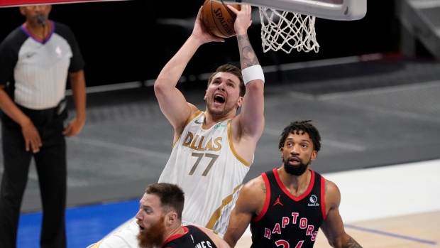 Luka Doncic, Khem Birch, The Canadian Press Luka Doncic, Khem Birch