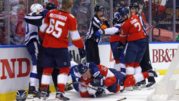 Panthers, Lightning fight after Bennett hit, Getty Images Panthers, Lightning fight after Bennett hit