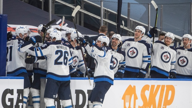 Winnipeg Jets celebrate, The Canadian Press Winnipeg Jets celebrate