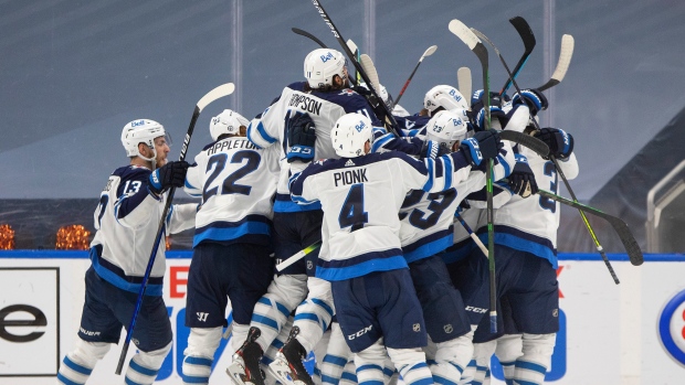 Winnipeg Jets celebrate, The Canadian Press Winnipeg Jets celebrate