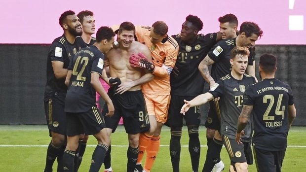 Robert Lewandowski celebrates with Bayern Munich