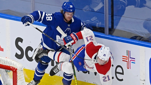 Rasmus Sandin, Eric Staal, The Canadian Press Rasmus Sandin, Eric Staal