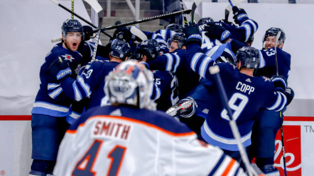 Winnipeg Jets celebrate 3OT goal