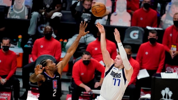 Luka Doncic and Kawhi Leonard , The Canadian Press Luka Doncic and Kawhi Leonard