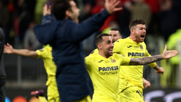 Villareal players celebrate after winning the Europa League final, The Canadian Press Villareal players celebrate after winning the Europa League final
