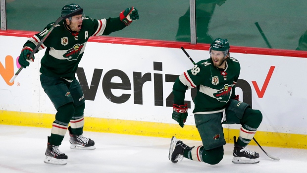Zach Parise, Ryan Hartman, The Canadian Press Zach Parise, Ryan Hartman