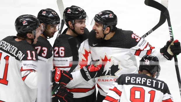 Cole Perfetti, Team Canada celebrate