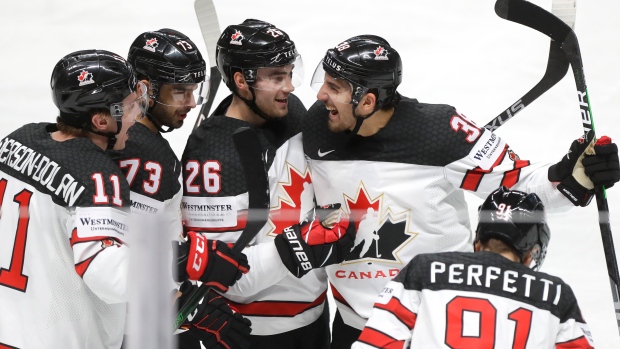 Cole Perfetti, Team Canada celebrate, The Canadian Press Cole Perfetti, Team Canada celebrate