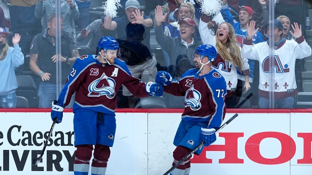 Nathan MacKinnon and Joonas Donskoi celebrate