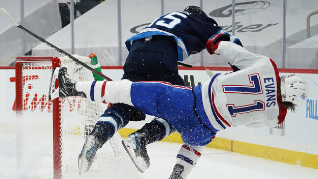 Mark Scheifele hits Jake Evans, Getty Images Mark Scheifele hits Jake Evans