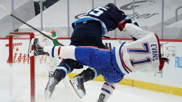 Mark Scheifele hits Jake Evans