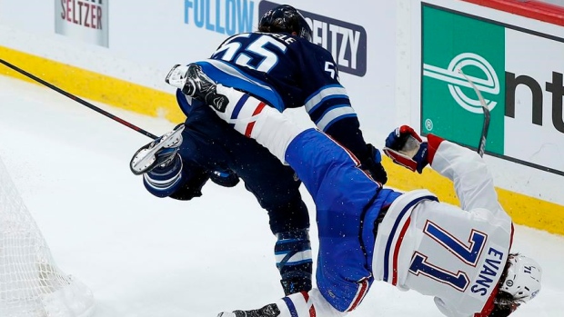 Mark Scheifele and Jake Evans, The Canadian Press Mark Scheifele and Jake Evans