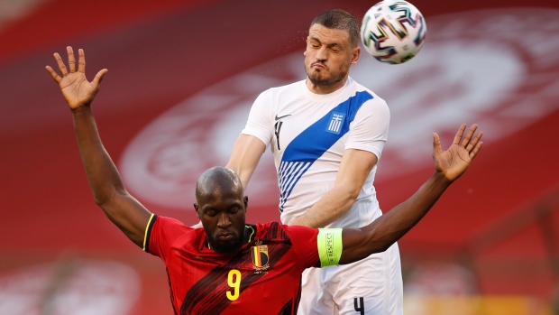 Belgium's Romelu Lukaku and Greece's Kyriakos Papadopoulos