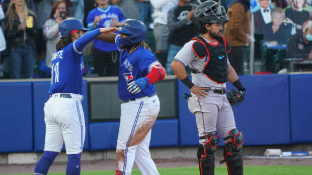 Vladimir Guerrero Jr. celebrates with Bo Bichette