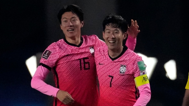 Hwang Ui-jo, left, and Son Heung-min