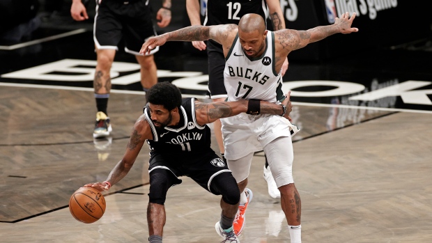 Kyrie Irving P.J. Tucker, The Canadian Press Kyrie Irving P.J. Tucker