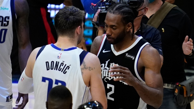 Luka Doncic, Kawhi Leonard, The Canadian Press Luka Doncic, Kawhi Leonard