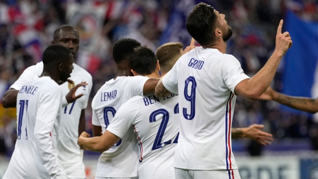 Olivier Giroud and France Celebrate , The Canadian Press Olivier Giroud and France Celebrate