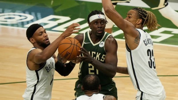 Jrue Holiday, The Canadian Press Jrue Holiday