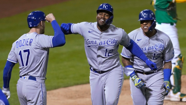 Jorge Soler, Hunter Dozier, Salvador Perez, The Canadian Press Jorge Soler, Hunter Dozier, Salvador Perez
