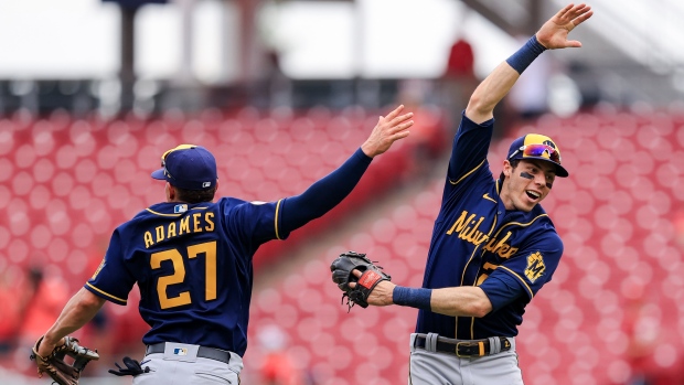 Christian Yelich, Willy Adames, The Canadian Press Christian Yelich, Willy Adames