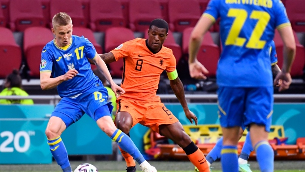 Oleksandr Zinchenko Georginio Wijnaldum, The Canadian Press Oleksandr Zinchenko Georginio Wijnaldum