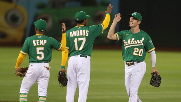 Oakland Athletics' Mark Canha, Elvis Andrus and Tony Kemp, The Canadian Press Oakland Athletics' Mark Canha, Elvis Andrus and Tony Kemp