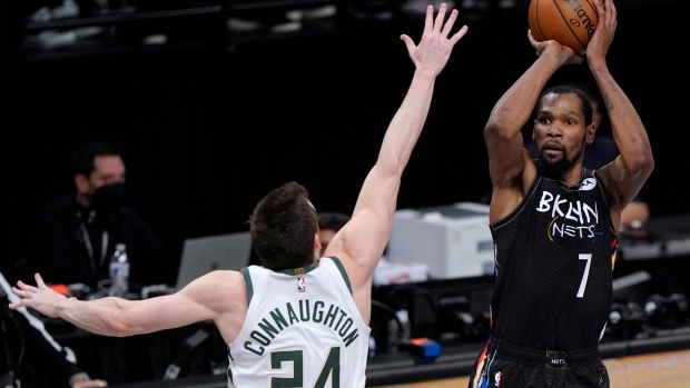 Kevin Durant shoots over Pat Connaughton, The Canadian Press Kevin Durant shoots over Pat Connaughton