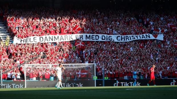 Denmark supporters display a banner for Christian Eriksen
