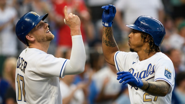 Hunter Dozier Adalberto Mondesi, The Canadian Press Hunter Dozier Adalberto Mondesi