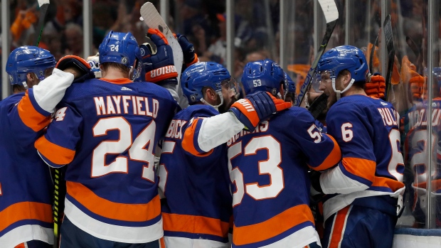 New York Islanders celebrate, The Canadian Press New York Islanders celebrate
